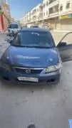 Mazda 323 Model 2002